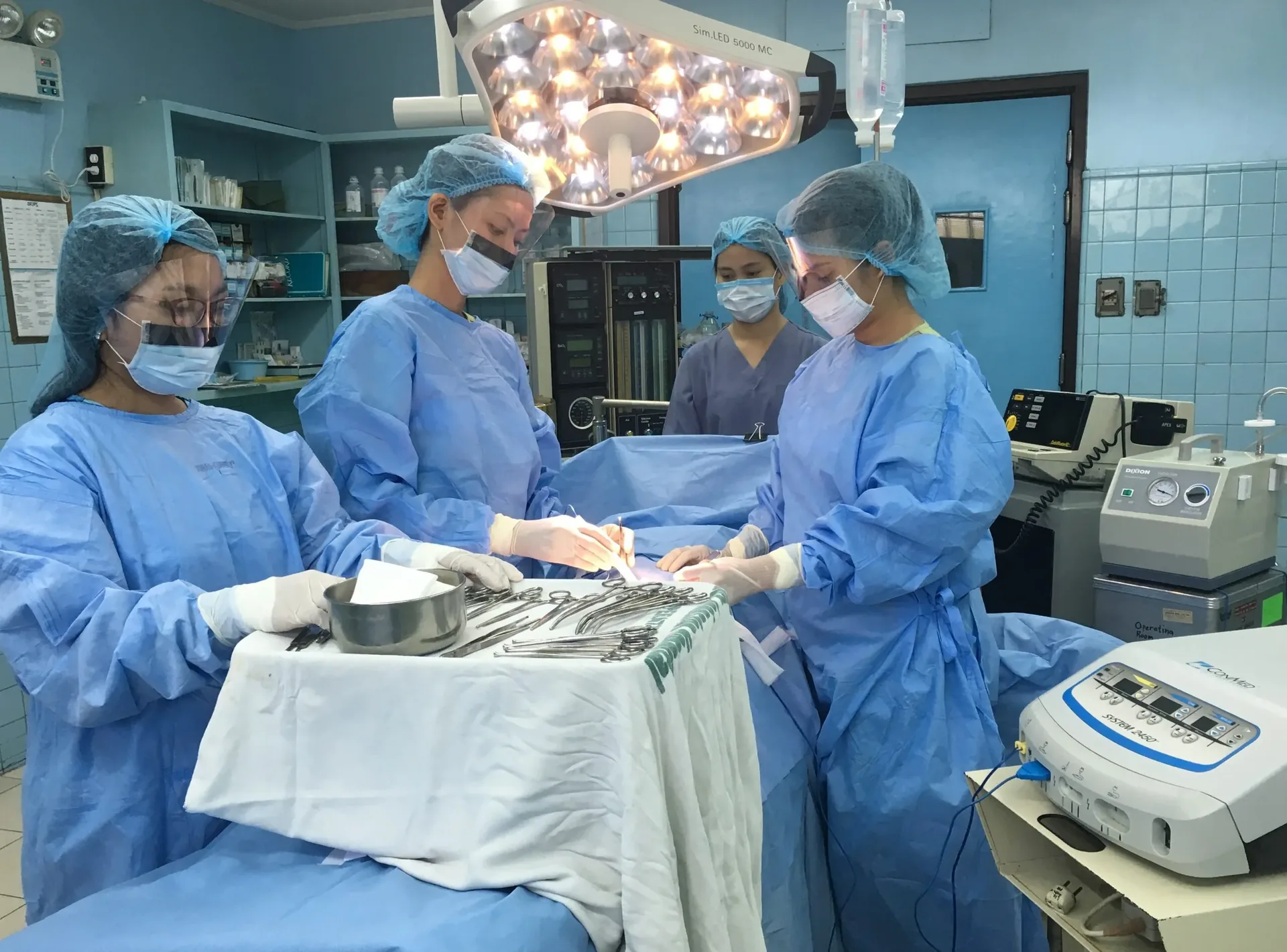 A Mary Johnston Hospital surgical team at work in an operating room